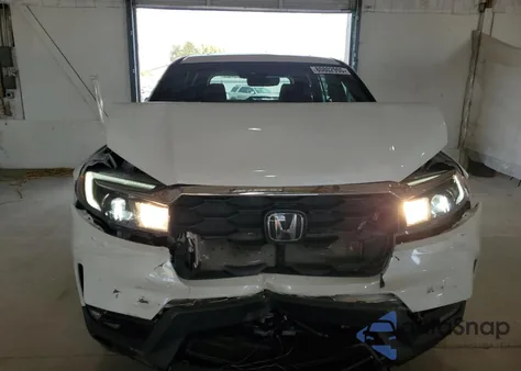 2024 Honda Passport Exl z USA, uszkodzony, nr VIN 5FNYF8H57RB007851